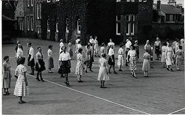 Photograph of a class dancing outside