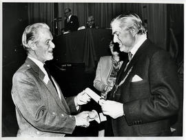 Photograph of scroll recipients and members at the AGM, 1988