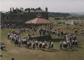 Photograph of dancers taking part in Dancing in the Streets 1994, dancing around the bandstand