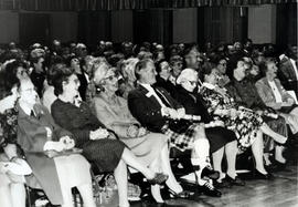 Photograph of Andrew Gillies receiving a scroll from Lord Mansfield at the AGM, 1988