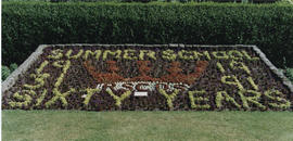 Photograph of a floral arrangement celebrating Sixty years of Summer School