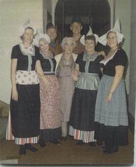 Photograph of group of people in Dutch national dress with Jean Milligan