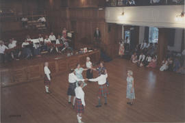 Photograph of the  'over sixties' team dancing in  the Younger Hall during the 60th Summer School