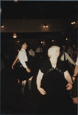 Photograph of Jean Milligan dancing the Axum Reel in the Younger Hall