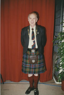 Photograph of Bill Clement wearing the Chairman's Chain of Office at the AGM 1996