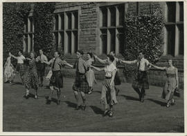 Photographs of Informal group dancing, taken outside at Summer School