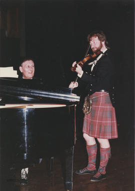 Photograph of Stan Hamilton and Alasdair Fraser Playing at a special dance party in memory of Tom...