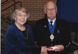 Photograph of Isabelle Macpherson  (Toronto Branch) being presented with a Scroll by Alastair Mac...