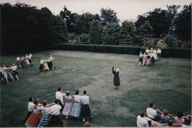 Photograph of dancers performing the Eightsome Reel taken from the air in the